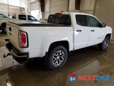 Trzecie zdjęcie samochodu z tyłu: 2016 GMC CANYON SLE VIN:1GTG6CE35G1141751 - miniatura