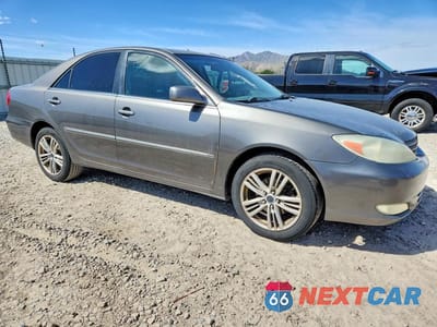Czwarte zdjęcie samochodu z boku: 2003 TOYOTA CAMRY XLE V6 VIN:4T1BF30K33U546262 - miniatura
