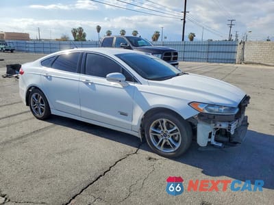 Czwarte zdjęcie samochodu z boku: 2016 FORD FUSION TITANIUM PHEV VIN:3FA6P0SU2GR241693 - miniatura