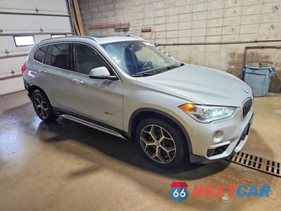Czwarte zdjęcie samochodu z boku: 2018 BMW X1 XDRIVE28I VIN:WBXHT3C34J5K21402 - miniatura