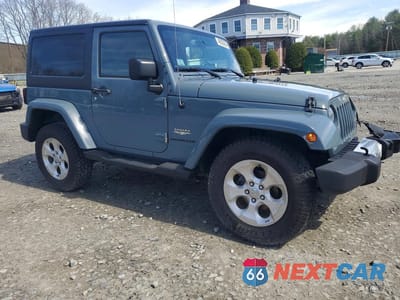 Czwarte zdjęcie samochodu z boku: 2015 JEEP WRANGLER SAHARA VIN:1C4AJWBG2FL620497 - miniatura