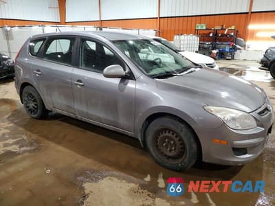 Czwarte zdjęcie samochodu z boku: 2012 HYUNDAI ELANTRA TOURING GLS VIN:KMHDB8AEXCU156950 - miniatura