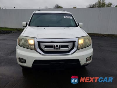 Piąte zdjęcie samochodu w środku: 2011 HONDA PILOT EX VIN:5FNYF3H45BB006178 - miniatura