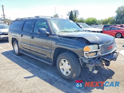 Czwarte zdjęcie samochodu z boku: 2005 GMC YUKON XL DENALI VIN:1GKFK66U25J115674 - miniatura
