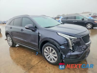 Czwarte zdjęcie samochodu z boku: 2022 CADILLAC XT4 SPORT VIN:1GYFZER43NF122966 - miniatura
