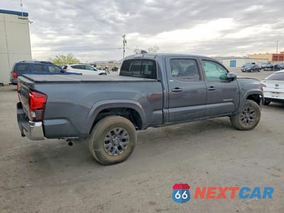 Trzecie zdjęcie samochodu z tyłu: 2023 TOYOTA TACOMA SR5 V6 VIN:3TMBZ5DN3PM038606 - miniatura