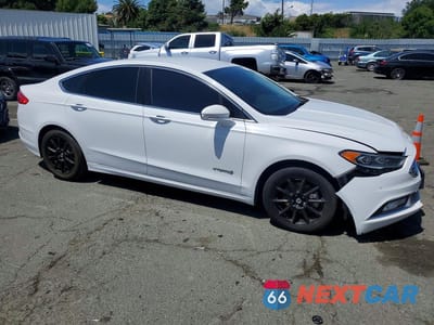 Czwarte zdjęcie samochodu z boku: 2017 FORD FUSION SE HYBRID VIN:3FA6P0LU8HR165395 - miniatura