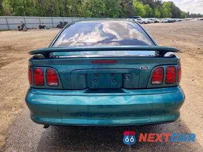 Zdjęcie 6 z 11 samochodu: 1998 FORD MUSTANG VIN:1FAFP4042WF242221 - miniatura