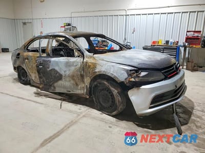 Czwarte zdjęcie samochodu z boku: 2015 VOLKSWAGEN JETTA BASE VIN:3VW2K7AJ0FM309604 - miniatura