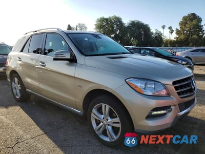 Czwarte zdjęcie samochodu z boku: 2012 MERCEDES-BENZ ML 350 BLUETEC VIN:4JGDA2EBXCA073472 - miniatura