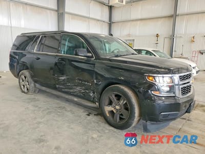 Czwarte zdjęcie samochodu z boku: 2015 CHEVROLET SUBURBAN K1500 LT VIN:1GNSKJKC1FR225586 - miniatura