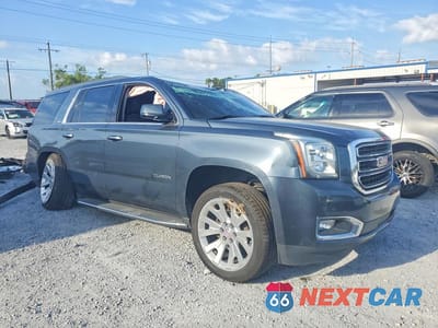 Czwarte zdjęcie samochodu z boku: 2020 GMC YUKON SLE VIN:1GKS2AKC1LR114934 - miniatura
