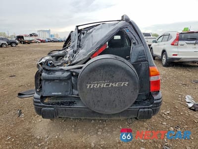Zdjęcie 6 z 12 samochodu: 2004 CHEV TRACKER VIN:2CNBJ634346907874 - miniatura