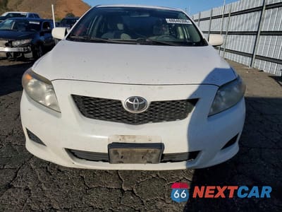 Piąte zdjęcie samochodu w środku: 2010 TOYOTA COROLLA LE VIN:JTDBU4EE3AJ074842 - miniatura