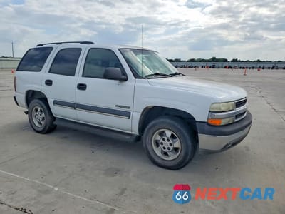 Czwarte zdjęcie samochodu z boku: 2003 CHEVROLET TAHOE C1500 VIN:1GNEC13Z03R180018 - miniatura