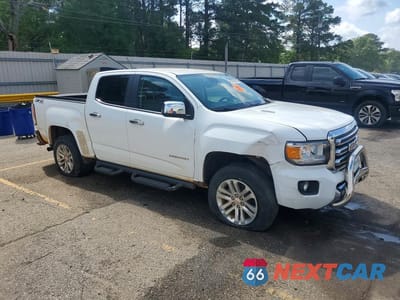 Czwarte zdjęcie samochodu z boku: 2016 GMC CANYON SLT VIN:1GTP6DE10G1325371 - miniatura