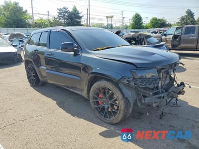 Czwarte zdjęcie samochodu z boku: 2015 JEEP GRAND CHEROKEE SRT-8 VIN:1C4RJFDJ9FC751986 - miniatura
