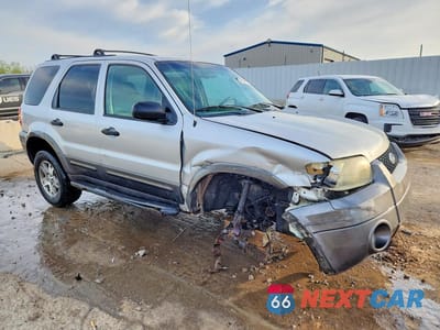 Czwarte zdjęcie samochodu z boku: 2005 FORD ESCAPE XLT VIN:1FMYU93125KA39681 - miniatura