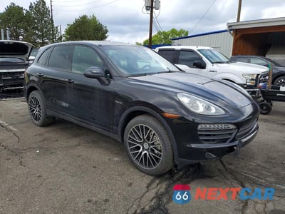 Czwarte zdjęcie samochodu z boku: 2011 PORSCHE CAYENNE S HYBRID VIN:WP1AE2A23BLA92657 - miniatura