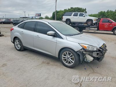 Czwarte zdjęcie samochodu z boku: 2015 FORD FOCUS SE VIN:1FADP3F21FL343064 - miniatura