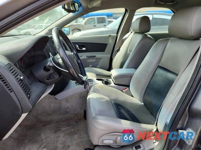 Zdjęcie 7 z 13 samochodu: 2004 CADILLAC CTS VIN:1G6DM577140119769 - miniatura