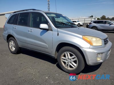 Czwarte zdjęcie samochodu z boku: 2003 TOYOTA RAV4 BASE VIN:JTEGH20V730094005 - miniatura