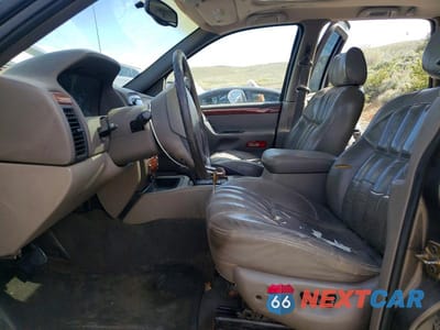 Zdjęcie 7 z 13 samochodu: 1999 JEEP GRAND CHEROKEE LIMITED VIN:1J4GW68N2XC677361 - miniatura