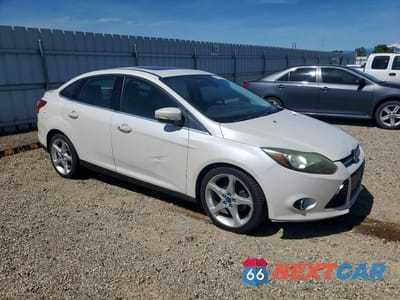 Czwarte zdjęcie samochodu z boku: 2012 FORD FOCUS TITANIUM VIN:1FAHP3J20CL468495 - miniatura