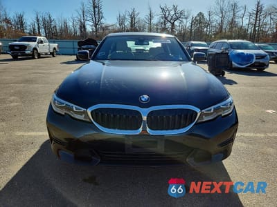 Piąte zdjęcie samochodu w środku: 2020 BMW 330XI VIN:WBA5R7C07LFH51534 - miniatura