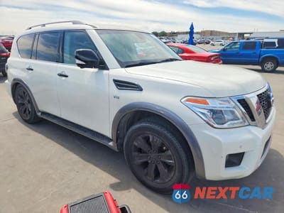 Czwarte zdjęcie samochodu z boku: 2017 NISSAN ARMADA PLATINUM VIN:JN8AY2NF6H9301700 - miniatura