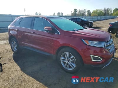 Czwarte zdjęcie samochodu z boku: 2017 FORD EDGE SEL VIN:2FMPK4J97HBB71203 - miniatura
