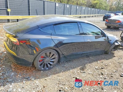 Trzecie zdjęcie samochodu z tyłu: 2021 TESLA MODEL 3 VIN:5YJ3E1EC8MF049493 - miniatura