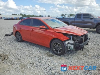 Czwarte zdjęcie samochodu z boku: 2022 KIA FORTE LXS VIN:3KPF24AD0NE420496 - miniatura