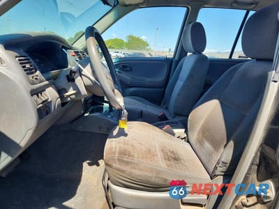 Zdjęcie 7 z 13 samochodu: 2000 CHEVROLET TRACKER VIN:2CNBJ13C2Y6914377 - miniatura