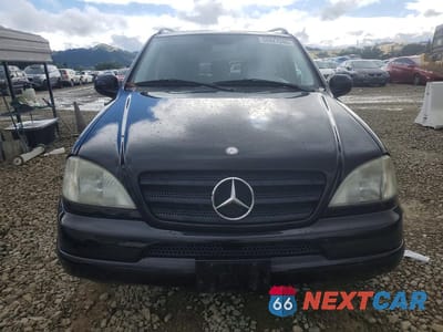 Piąte zdjęcie samochodu w środku: 2000 MERCEDES-BENZ ML 320 VIN:4JGAB54E2YA165891 - miniatura