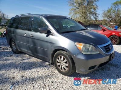 Czwarte zdjęcie samochodu z boku: 2010 HONDA ODYSSEY EXL VIN:5FNRL3H6XAB038458 - miniatura