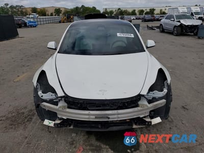 Piąte zdjęcie samochodu w środku: 2022 TESLA MODEL 3 VIN:5YJ3E1ECXNF108996 - miniatura