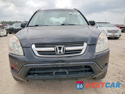 Piąte zdjęcie samochodu w środku: 2005 HONDA CR-V LX VIN:JHLRD68535C015289 - miniatura