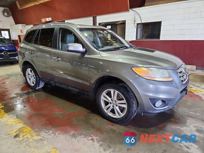 Czwarte zdjęcie samochodu z boku: 2011 HYUNDAI SANTA FE SE VIN:5XYZHDAGXBG031823 - miniatura