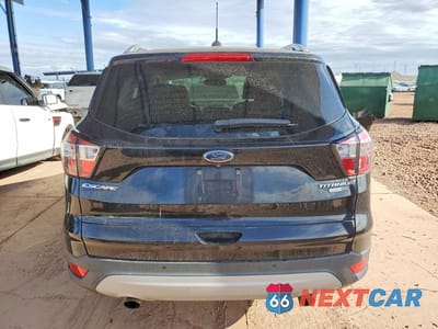 Zdjęcie 6 z 12 samochodu: 2017 FORD ESCAPE TITANIUM VIN:1FMCU9JD9HUD63548 - miniatura
