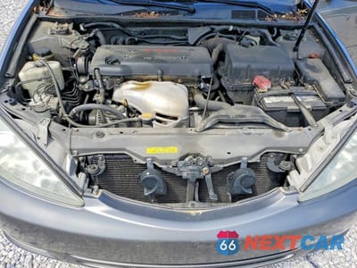 Zdjęcie 11 z 11 samochodu: 2003 TOYOTA CAMRY LE VIN:4T1BE32K13U704985 - miniatura