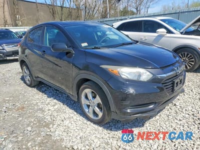 Czwarte zdjęcie samochodu z boku: 2016 HONDA HR-V LX VIN:3CZRU6H31GM720700 - miniatura