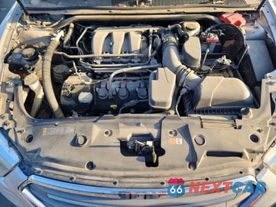 Zdjęcie 11 z 11 samochodu: 2014 FORD TAURUS SEL VIN:1FAHP2E80EG174423 - miniatura