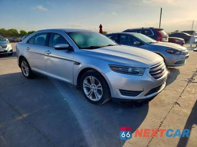 Czwarte zdjęcie samochodu z boku: 2014 FORD TAURUS SEL VIN:1FAHP2E80EG174423 - miniatura