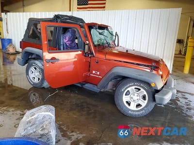 Czwarte zdjęcie samochodu z boku: 2009 JEEP WRANGLER X VIN:1J4FA24199L779992 - miniatura