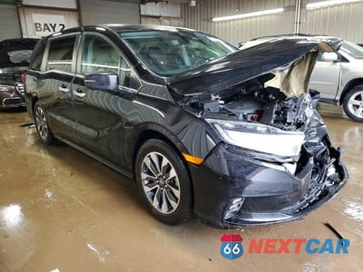Czwarte zdjęcie samochodu z boku: 2021 HONDA ODYSSEY EXL VIN:5FNRL6H7XMB041651 - miniatura