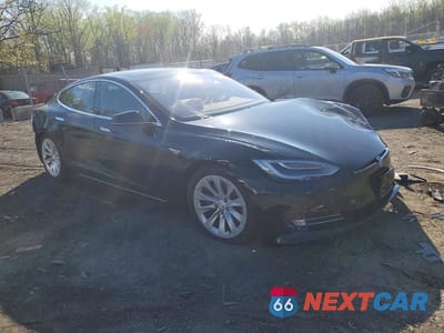 Czwarte zdjęcie samochodu z boku: 2016 TESLA MODEL S VIN:5YJSA1E2XGF144589 - miniatura