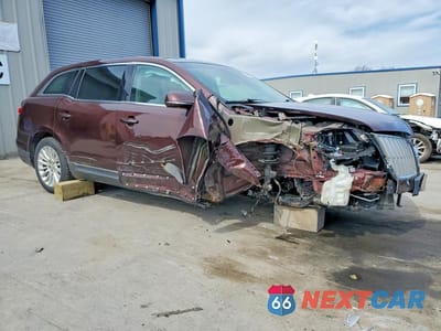 Czwarte zdjęcie samochodu z boku: 2012 LINCOLN MKT VIN:2LMHJ5AT8CBL53398 - miniatura