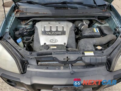 Zdjęcie 12 z 13 samochodu: 2007 HYUNDAI TUCSON SE VIN:KM8JN72D37U494187 - miniatura
