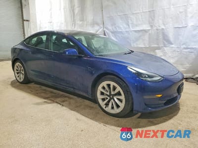 Czwarte zdjęcie samochodu z boku: 2022 TESLA MODEL 3 VIN:5YJ3E1EA1NF190874 - miniatura
